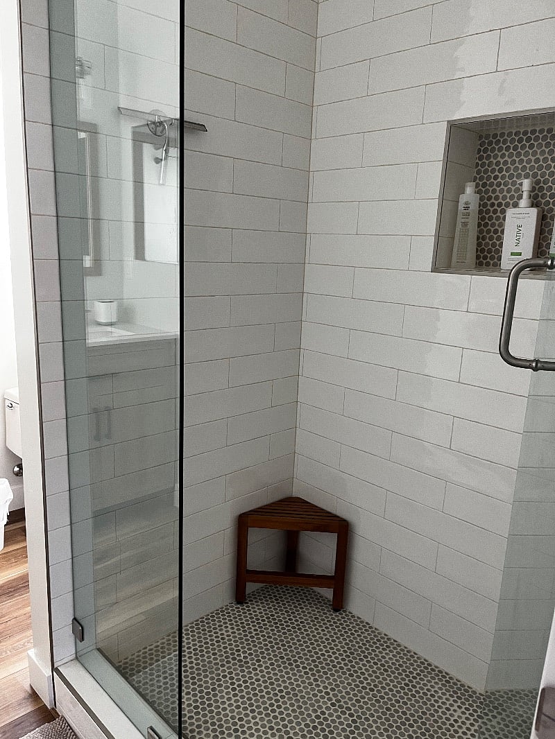 Full size shower with corner stool if needed.