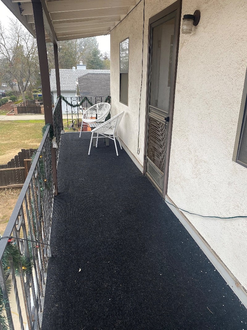 large private outdoor space off the living room. your personal driveway parking space is just below.