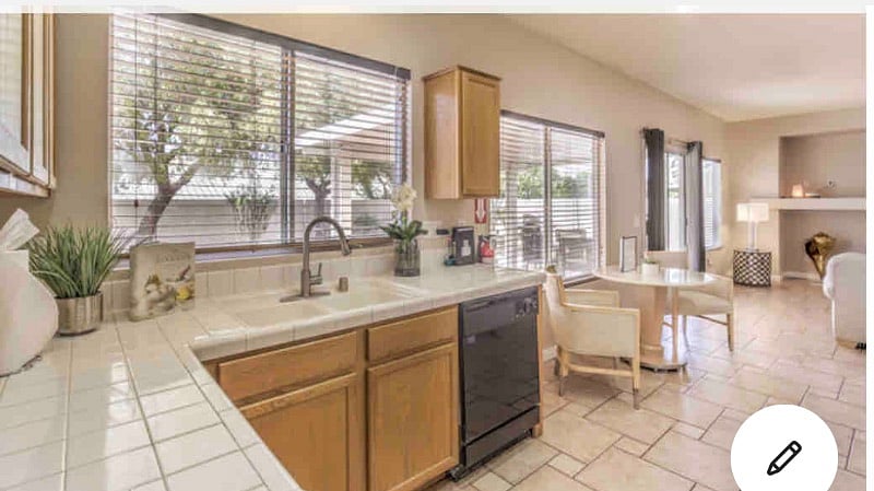 Kitchen fully equipped and kitchen table with 2-3 chairs.