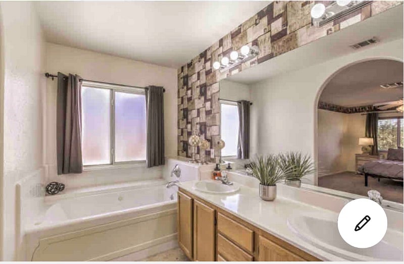 Master bathroom. Jacuzzi bathtub, dual sinks, large shower and toilet in separate room.