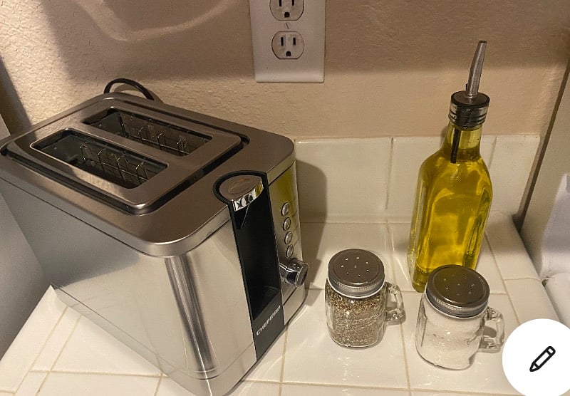 Toaster, oil and salt/pepper shakers.