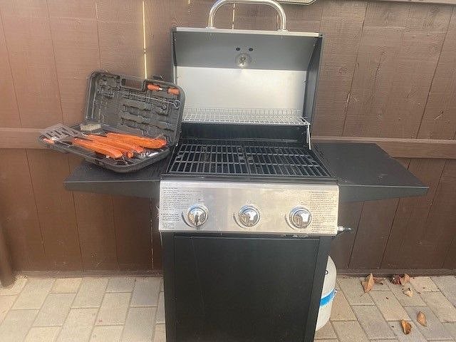 Outside BBQ set, that includes all utensils needed to BBQ