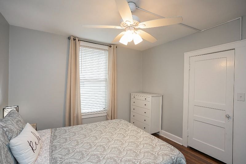 Bedroom #3 with queen bed, dresser, and closet