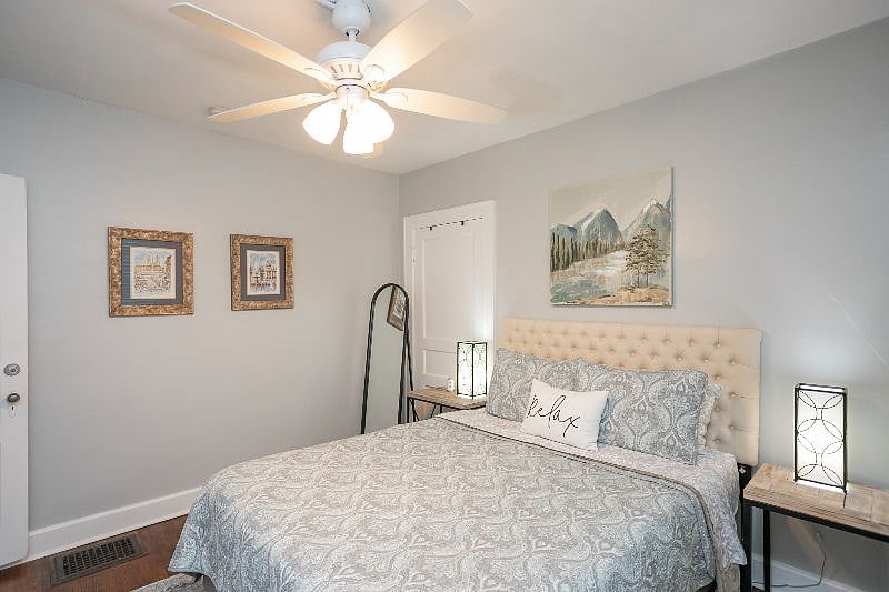 Bedroom #3 with queen bed, dresser, and closet