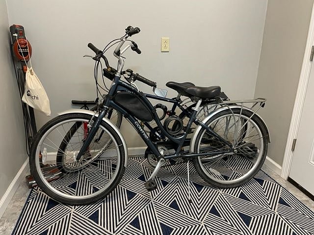two bicycles for your use with helmets, locks and tire pump