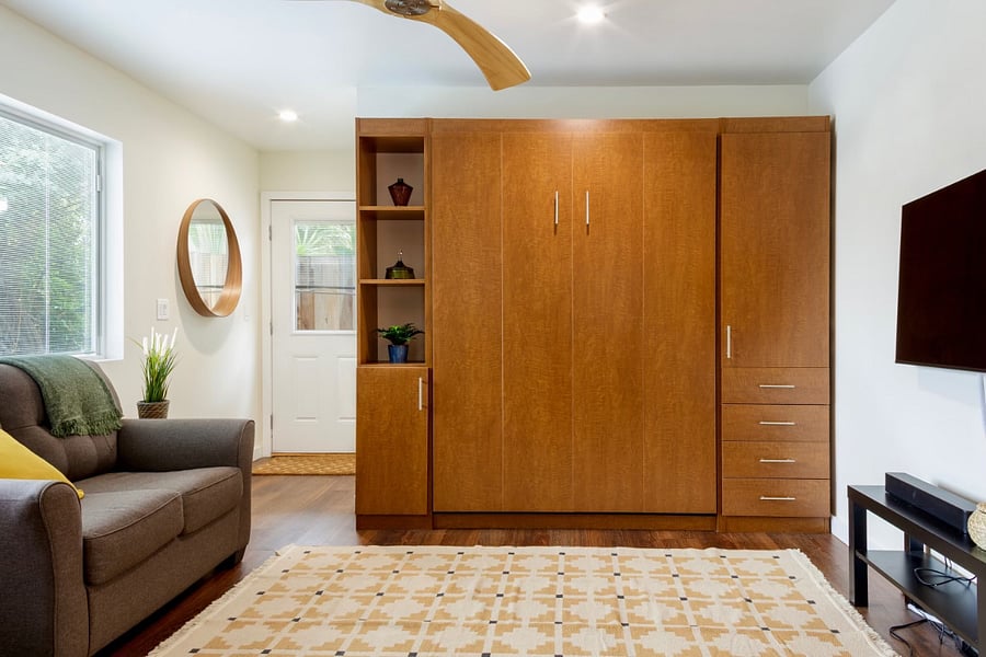 Murphy bed put up in the wall to maximize floor space if needed.