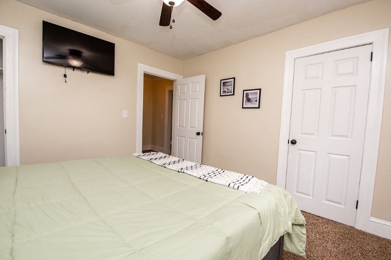 King bedroom with TV