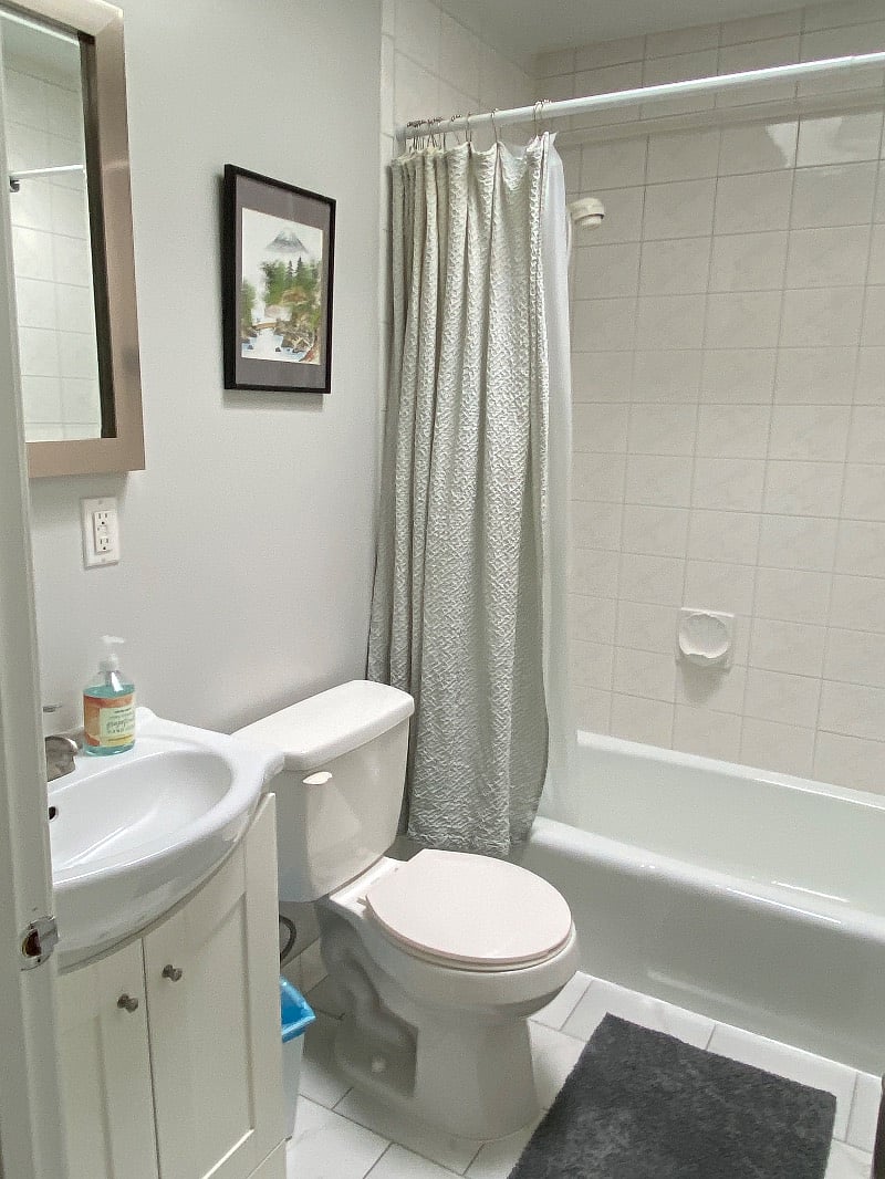 Bathroom flooded with light from a skylight