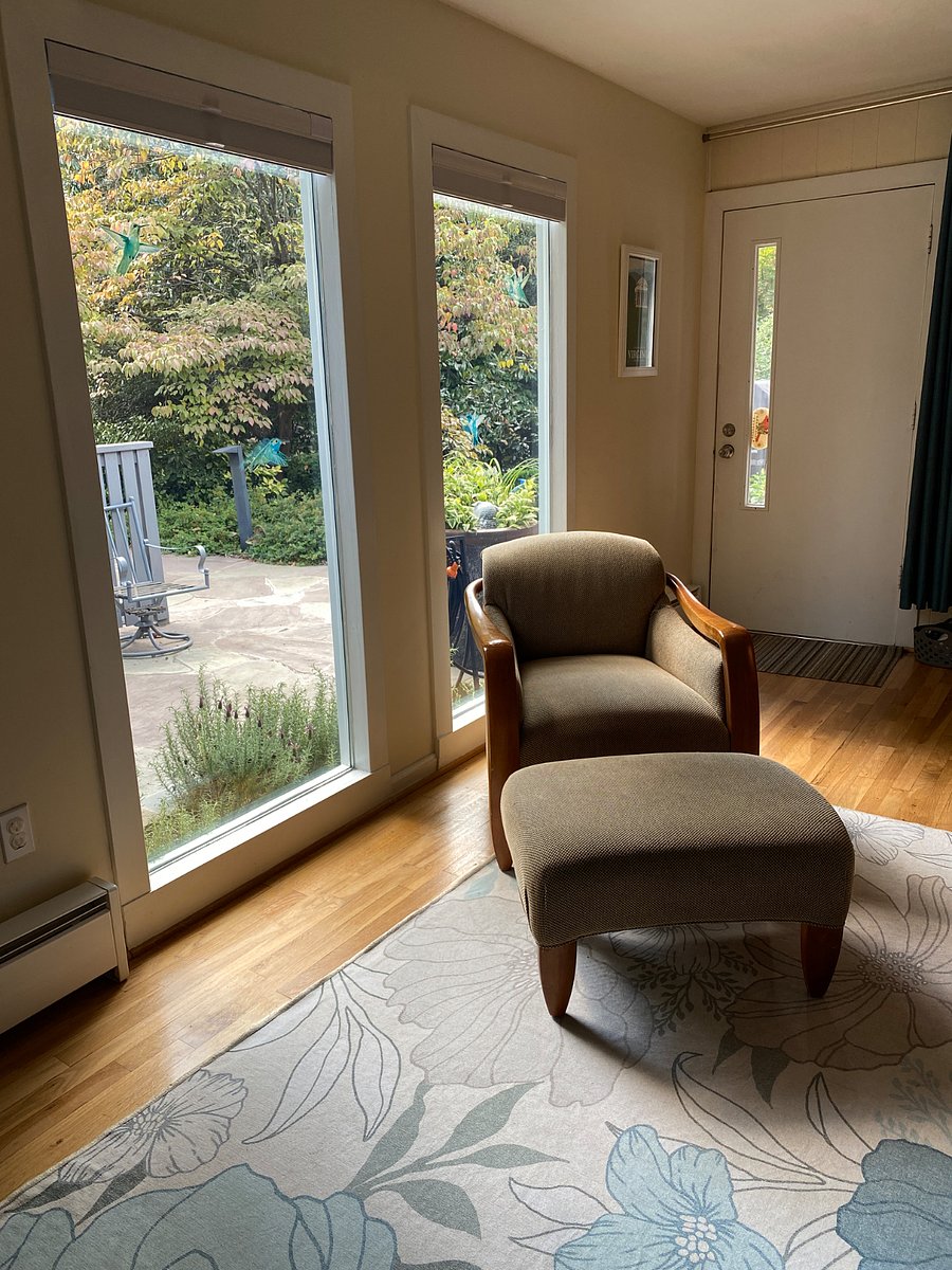 Floor to ceiling windows provide lots of natural light in the living room/dining area!
