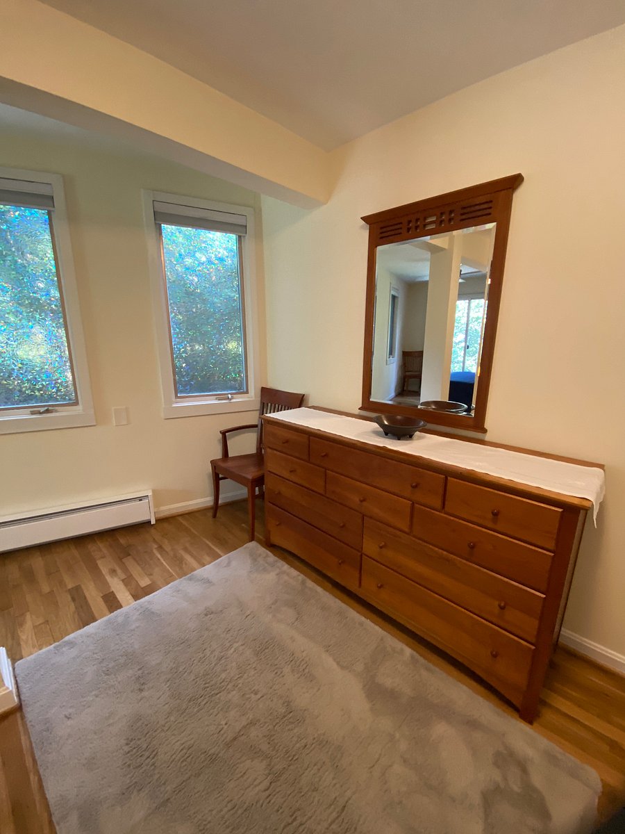 Bedroom included a solid cherry wood dresser and matching mirror, while windows have room darkening, cordless, up/down shades to control the amount of light