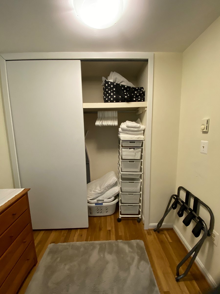 Closet has plenty of storage space and extra linens