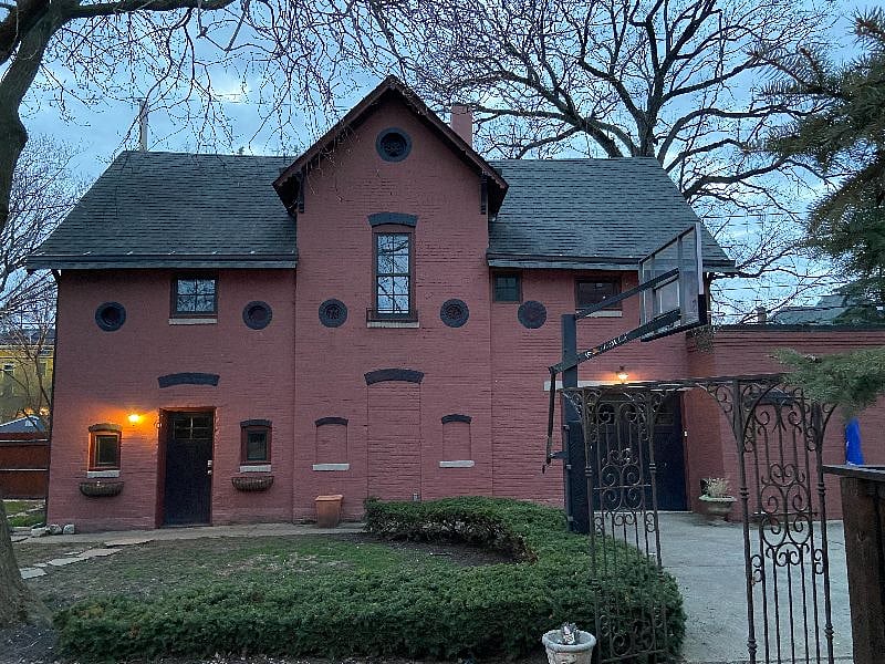 Carriage house. The apartment is the top level