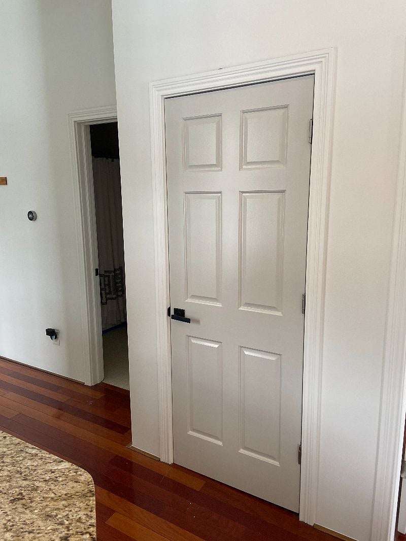door to spacious pantry in kitchen