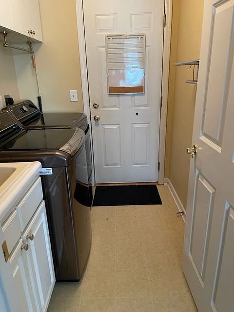 laundry room attached to kitchen