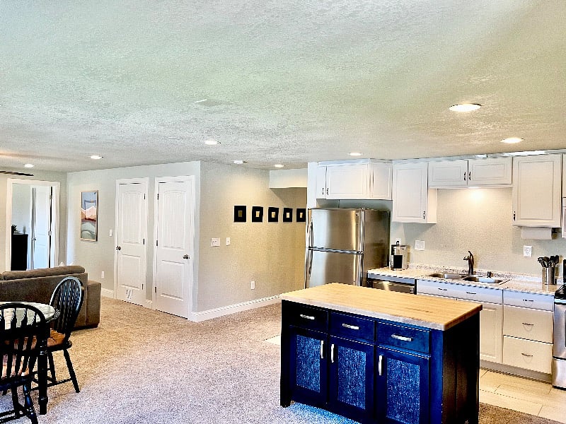 Fully stocked kitchen with large butcher block island.
