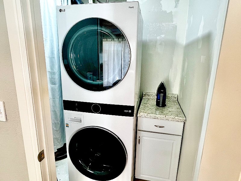 Top-of-the-line LG WashTower with steam in private laundry room.