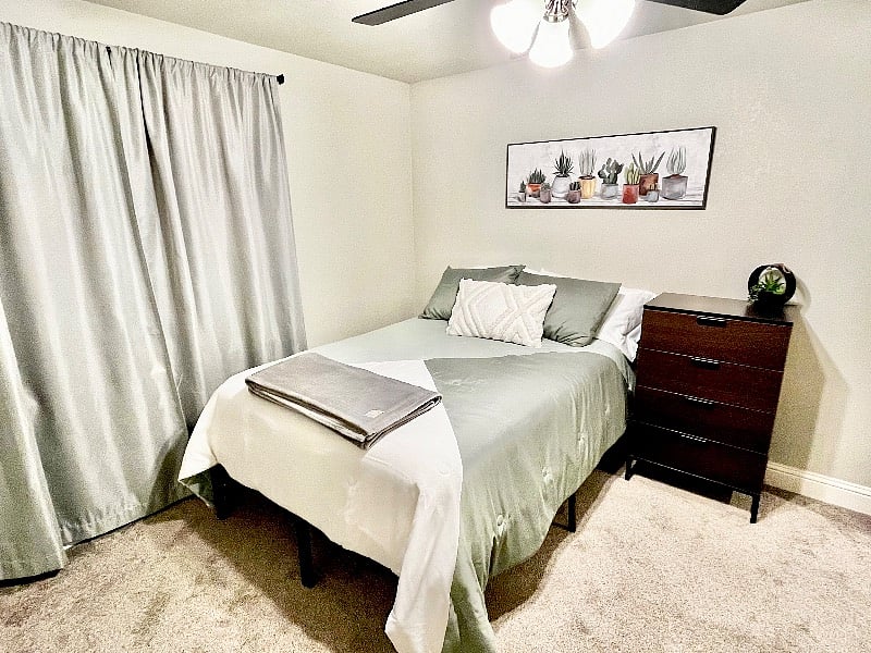 Optional full bed and dresser in second bedroom.