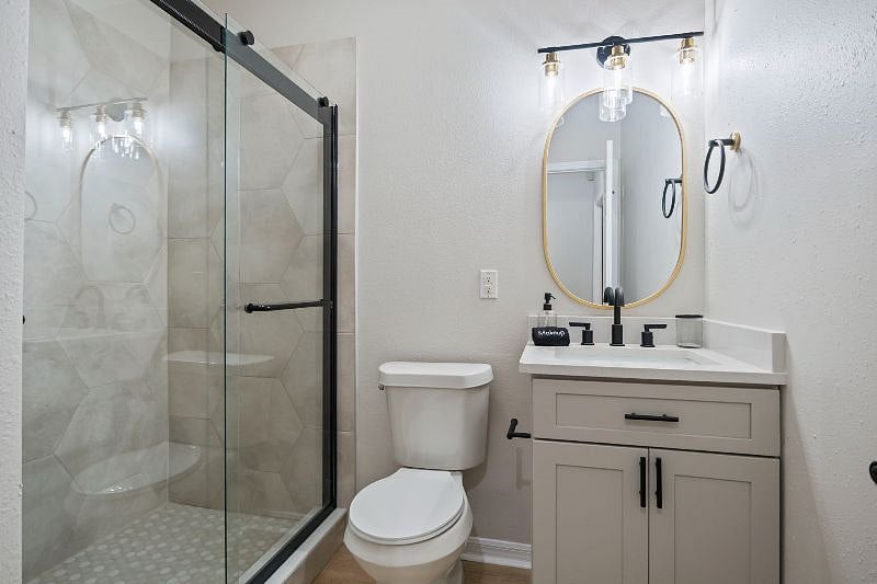 Room 3 is our 1st Floor Guest Bedroom and Private Bathroom. Rental rate is $1600 with garage parking. Includes a TV.