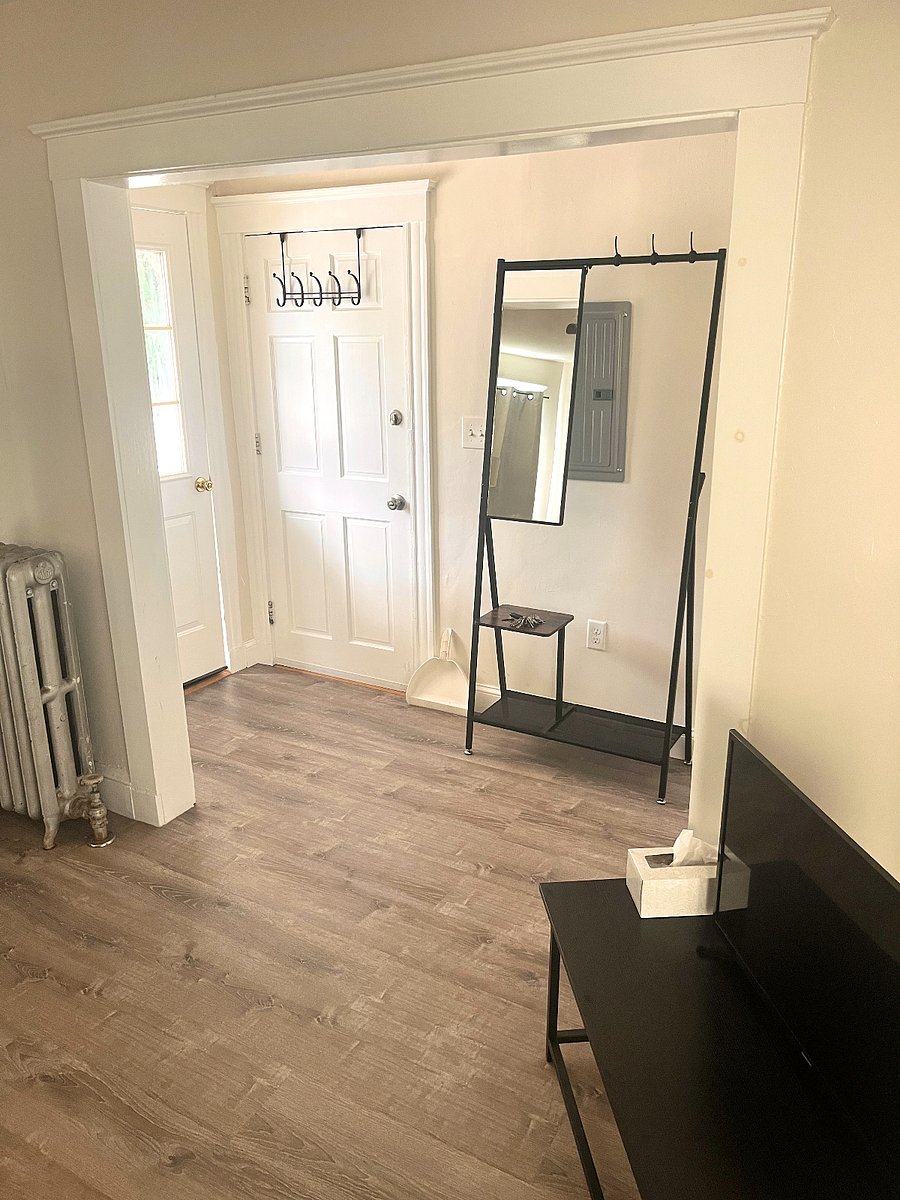 Entranceway into front room/lounge. Picture shows patio door on left.