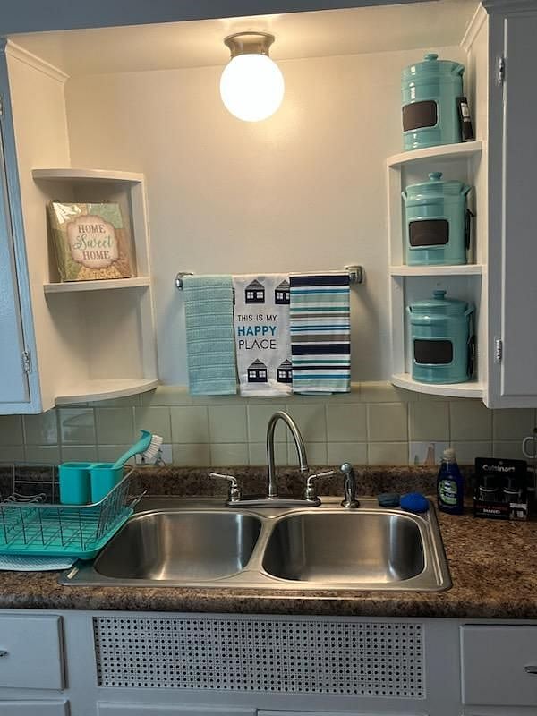 Kitchen sink area with kitchen hand towels 