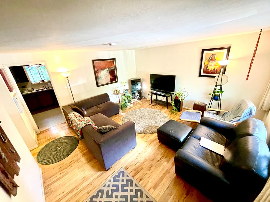 Cozy living room with east facing windows, which gives beautiful morning light.