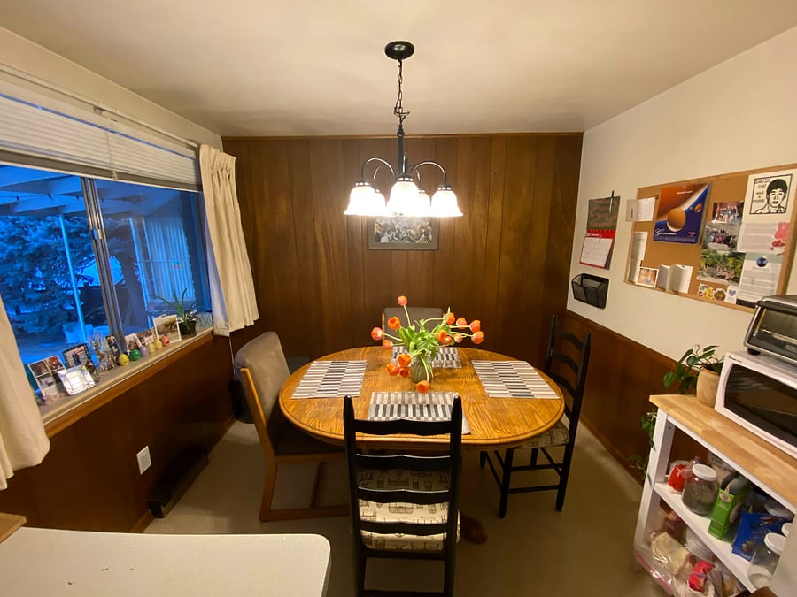 Dining room just off the kitchen with a view into the brand new back patio area!