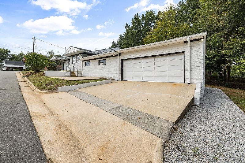 ~Gravel walk way to private ground level entrance.

~Fenced in area in back for small dogs!