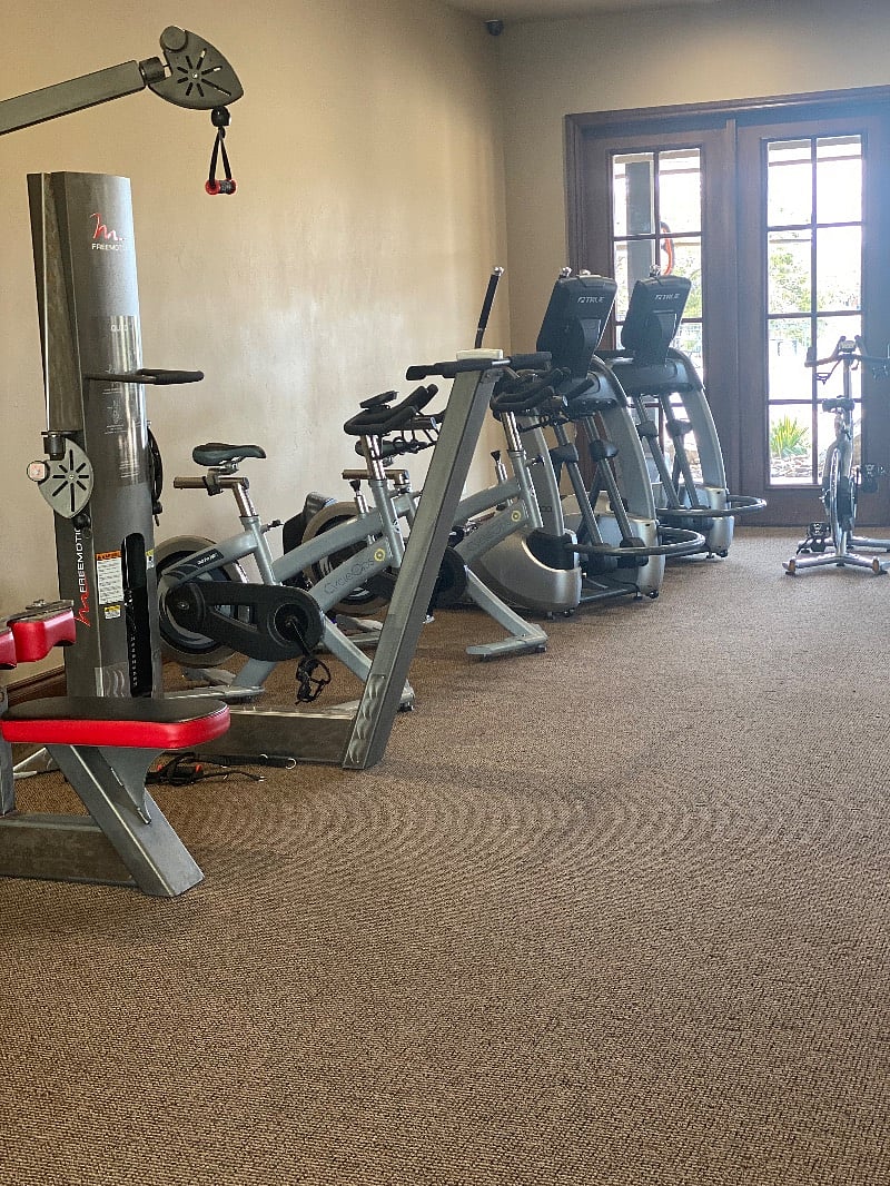 Fitness center in our Clubhouse right across our driveway to across the street.
Clubhouse, pool, picnic shaded area and lake view.