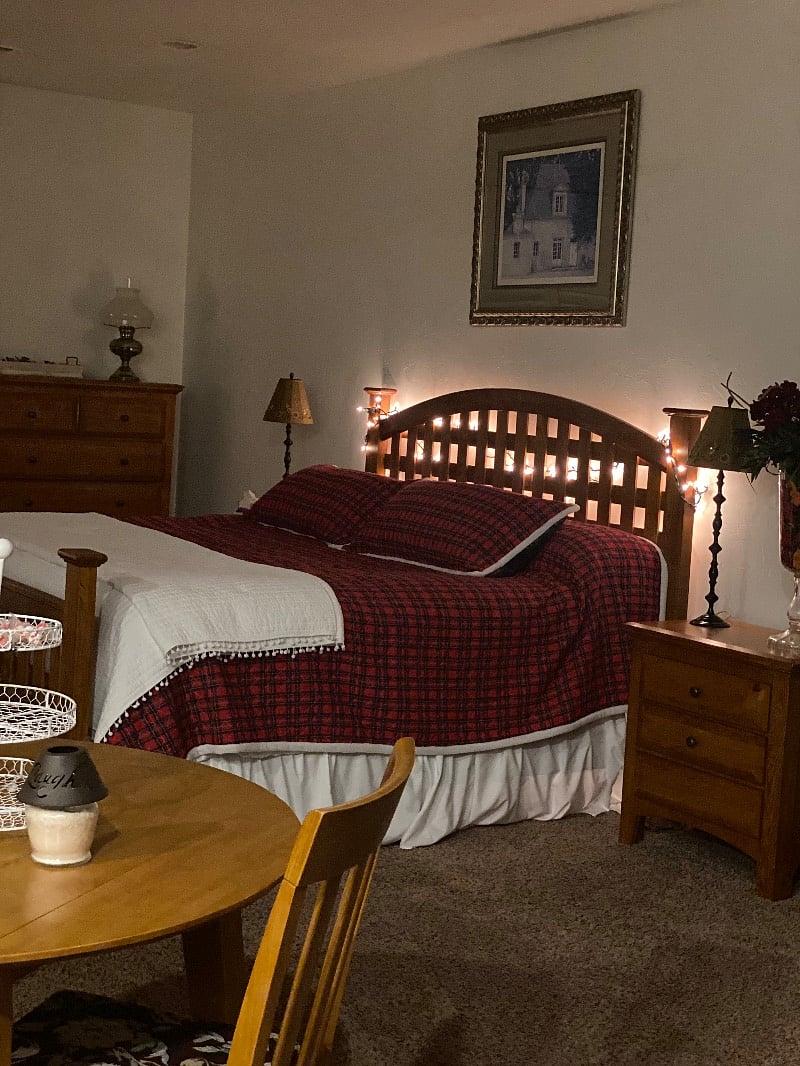 King bed with 2 year old mattress, used less than 10 times and has a firm mattress with a pillow topper added topper.