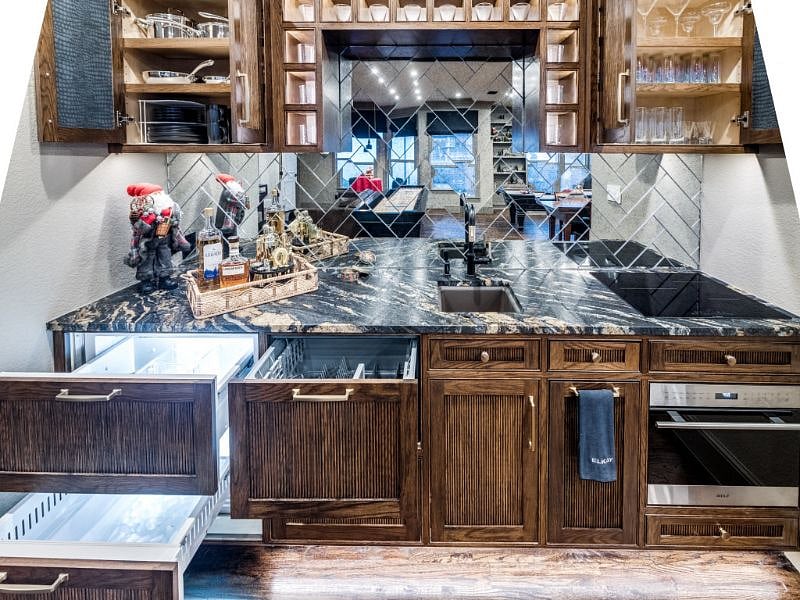 But wait! It's a fully functional kitchen! Sub Zero regrigerator/freezer drawers with ice maker, Wolf Speed Oven, Bosch cooktop and even a Fisher & Paykel dishwasher drawer! Everything you need to cook or relax!