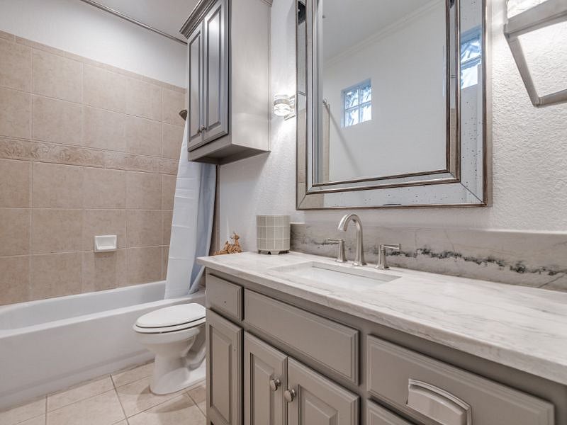 New fixtures and freshly painted bathroom.