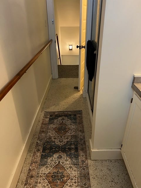 2nd level bath includes sink, walk in shower, stool.