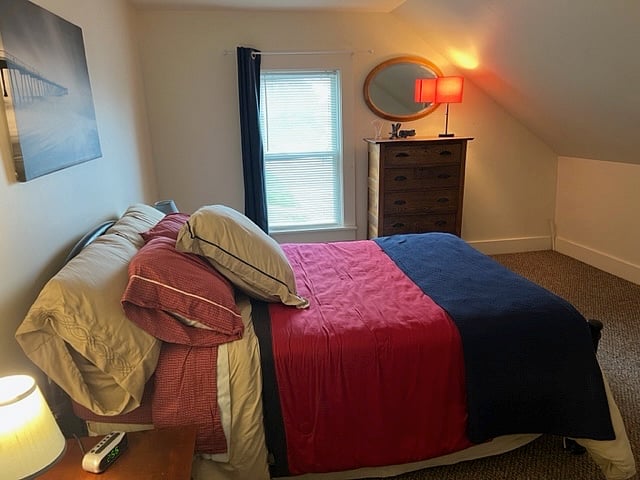 2nd level bedroom #2 queen bed, closet, dresser