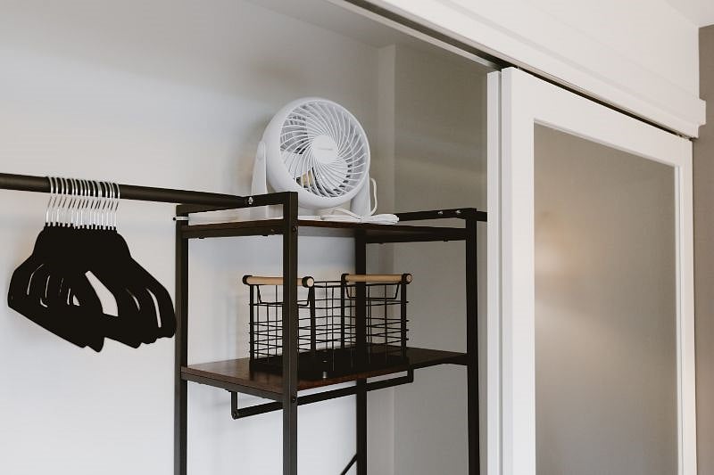 Closet Storage and portable fan in bedroom #2