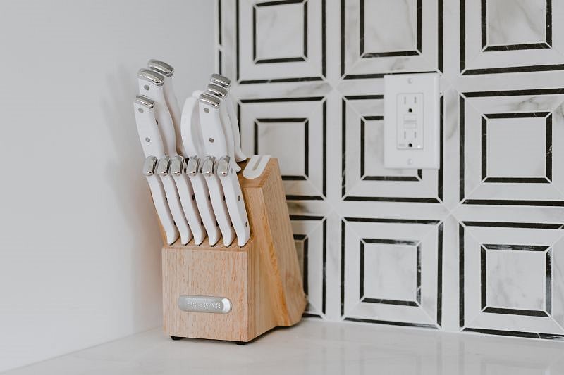 The home has a fully stocked, beautiful and functional kitchen.