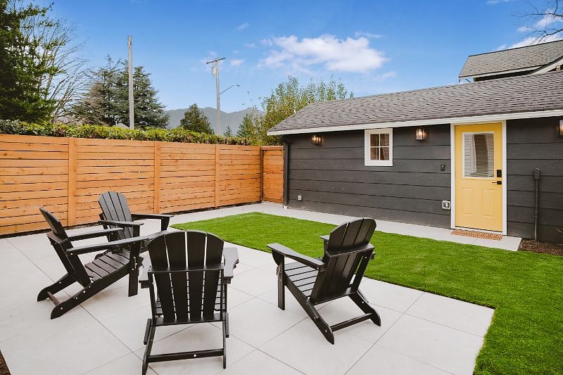 Super Cute and private backyard with peekaboo views of Mt Si. Photo is facing the detached room.