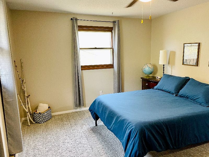 Bedroom with queen bed.