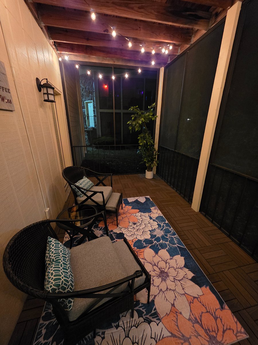 Screened patio at night.