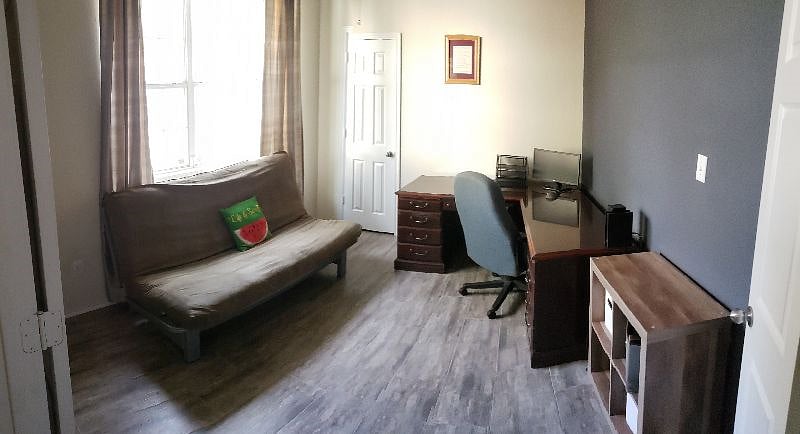 4th bedroom with pull-out futon and large desk for work-from-home option