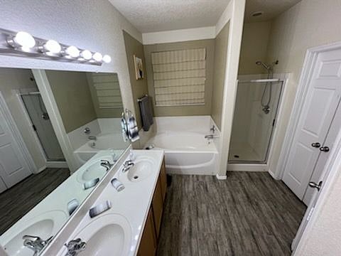 Master Bath with dual sinks and look at that big, relaxing garden tub!
