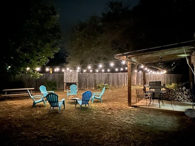 Big, private yard in back of home.
BBQ or enjoy the fire pit - and take in those big Texas starry nights!