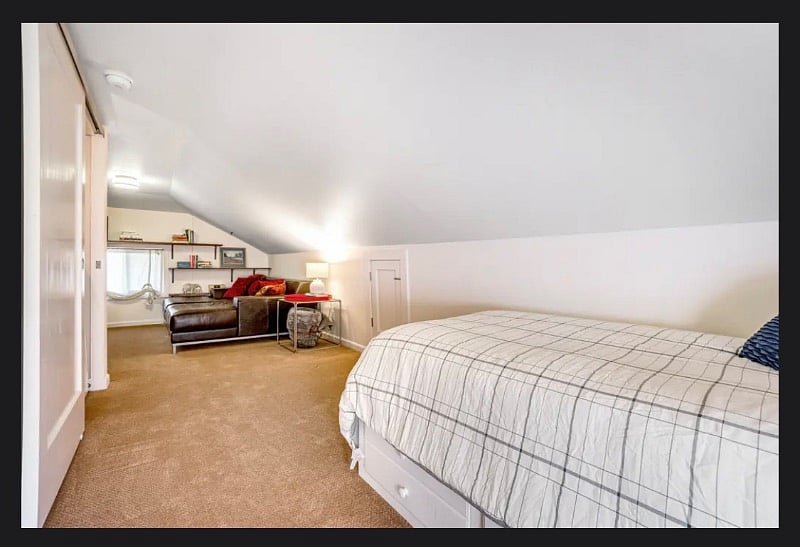 View from twin bed toward den