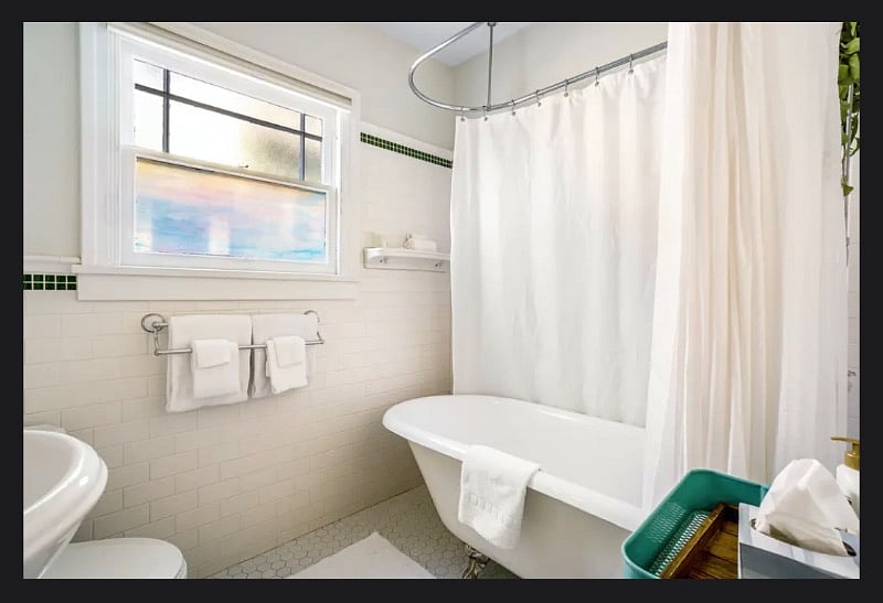 Fully renovated bathroom with shower and clawfoot tub