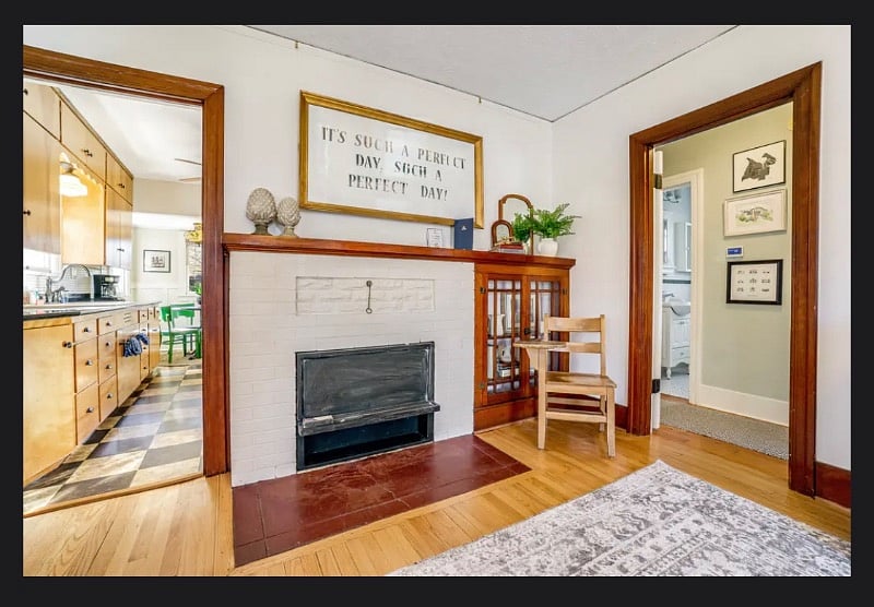 A peek of the Tacoma gallery wall Im the hallway that leads to 2 bedrooms and the bath