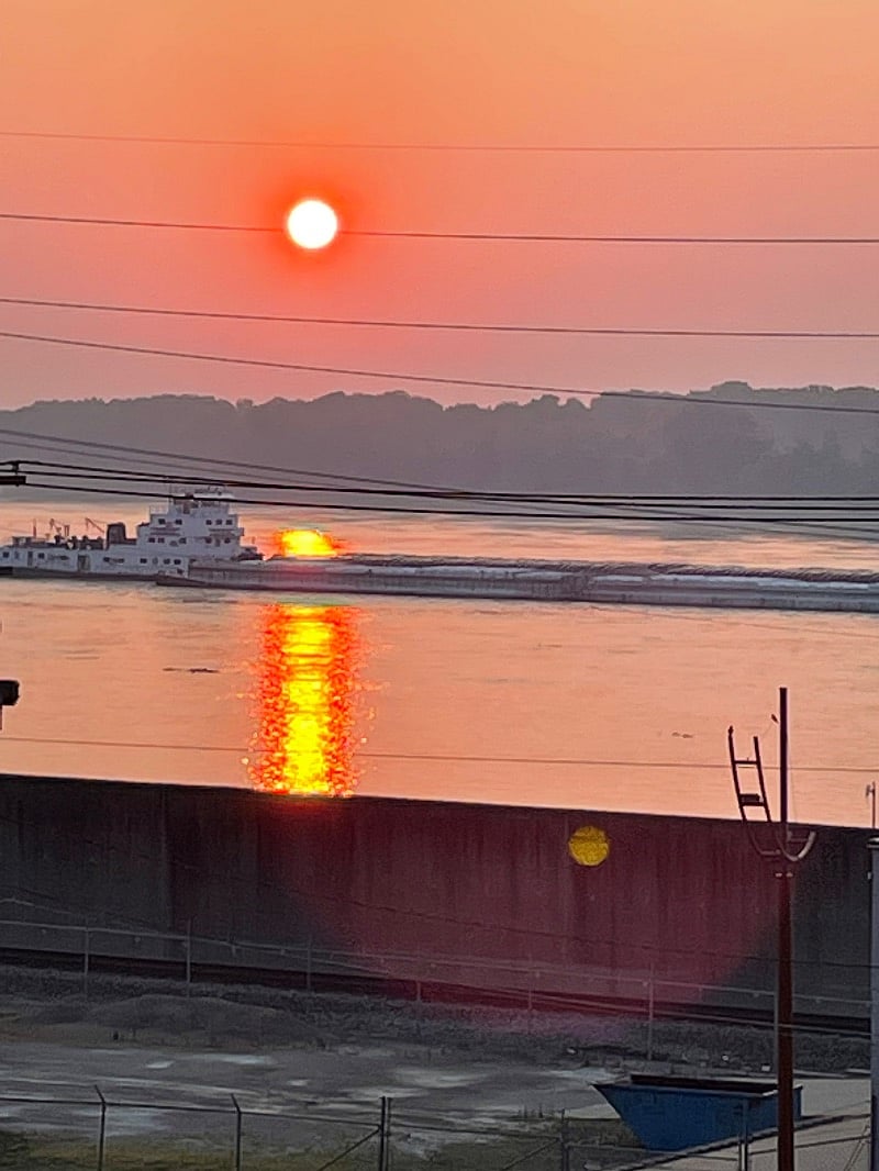 River view with beautiful sun and moon rises over the Mississippi. 