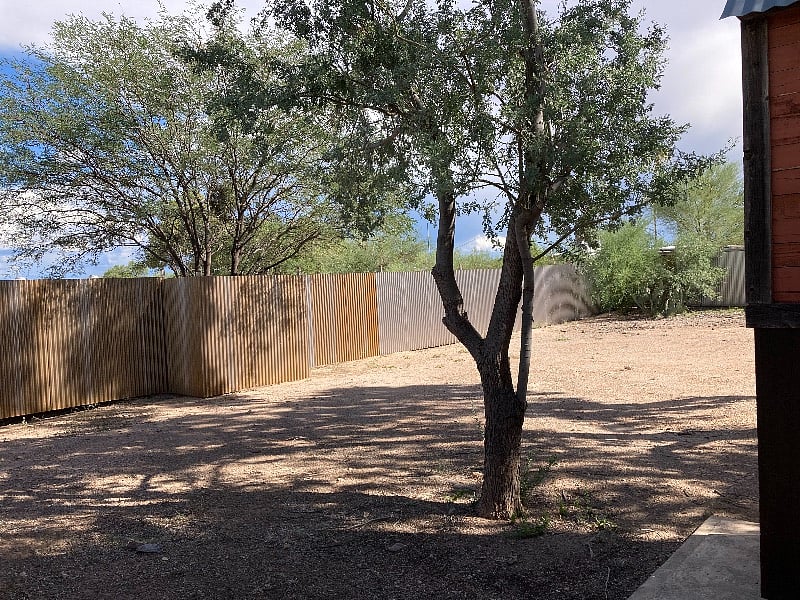 Large, fully fenced backyard