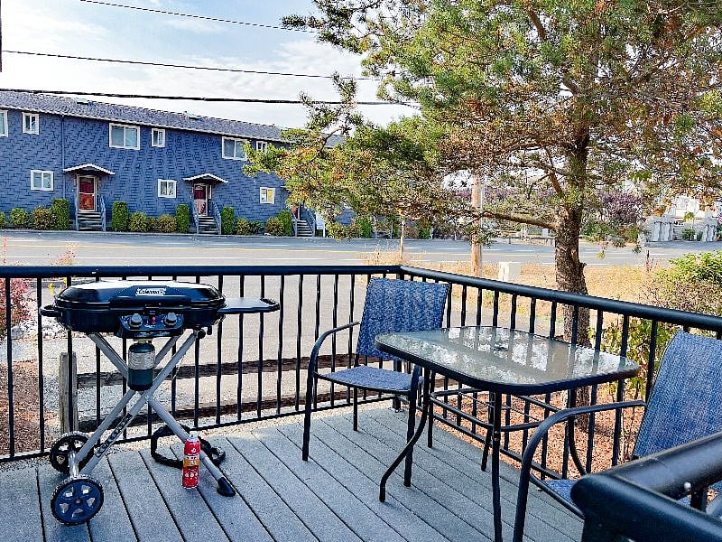 Grill and dine al fresco on the side deck