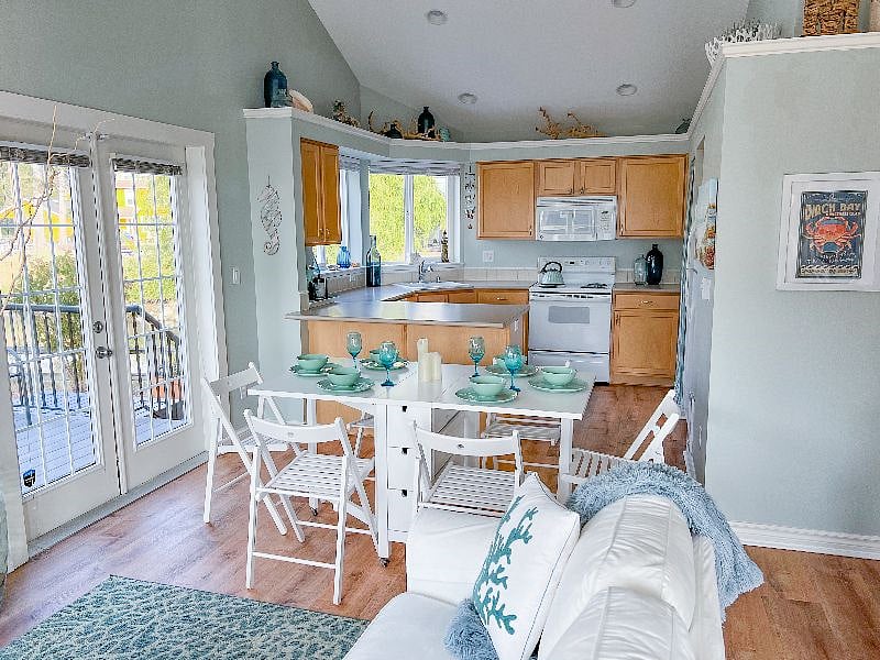 Use this space as a dining area, or fold the table in to its storage position and put the chairs away in the closet for more living space.