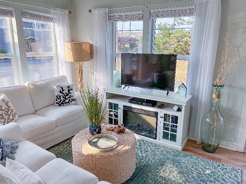 Main living area has an electric fire and smart tv