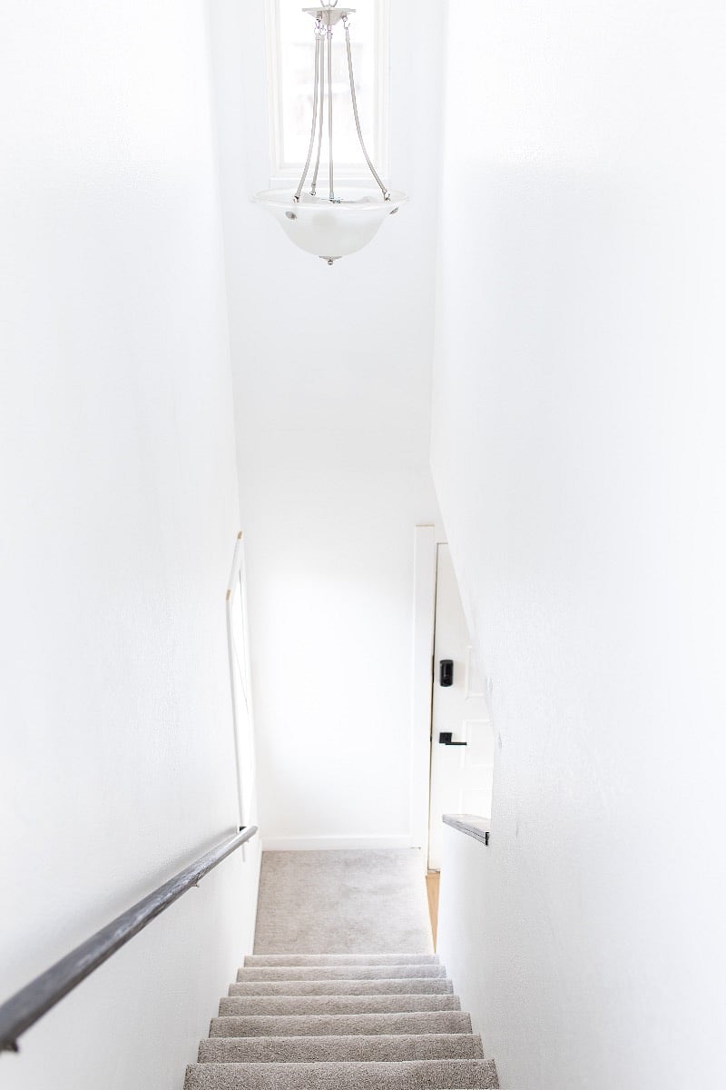 Hallway leading to bedrooms and primary bathroom.